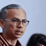 Fahmi Urges Customers to Report Unauthorized ATM Fees to BNM
