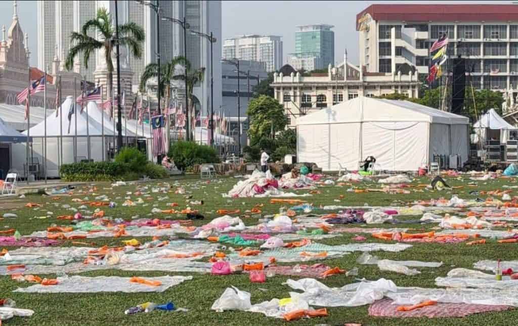 Dataran Merdeka buried in trash