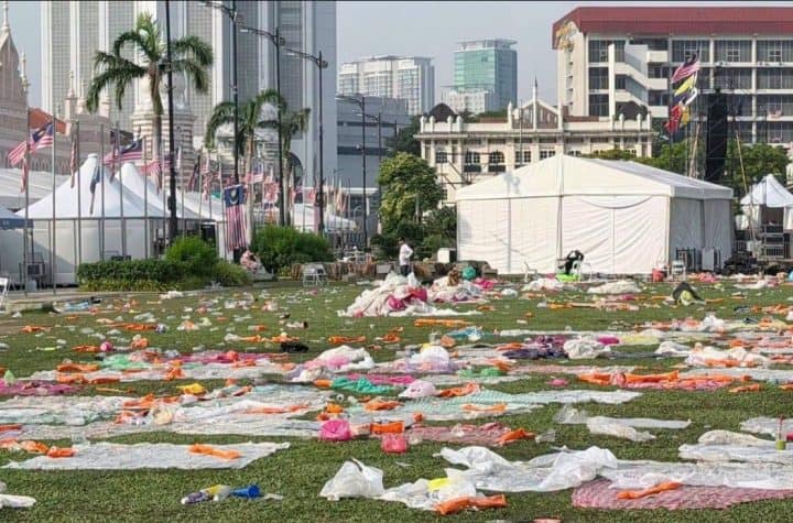 Dataran Merdeka buried in trash