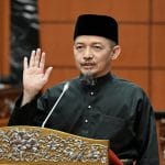 Nik Mohamad Abduh Sworn In for Second Term as Senator