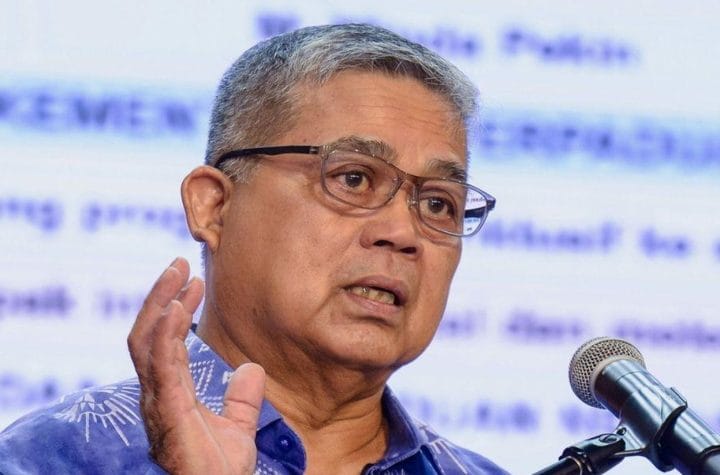 Unity Minister Catholic priest joke investigation UMNO